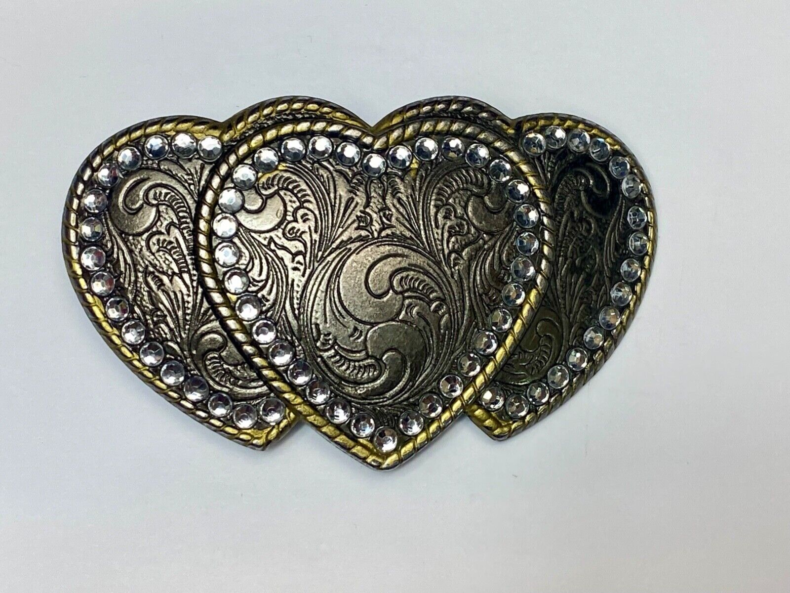 Three hearts ornate flower swirl belt buckle with thick rhinestone boarder