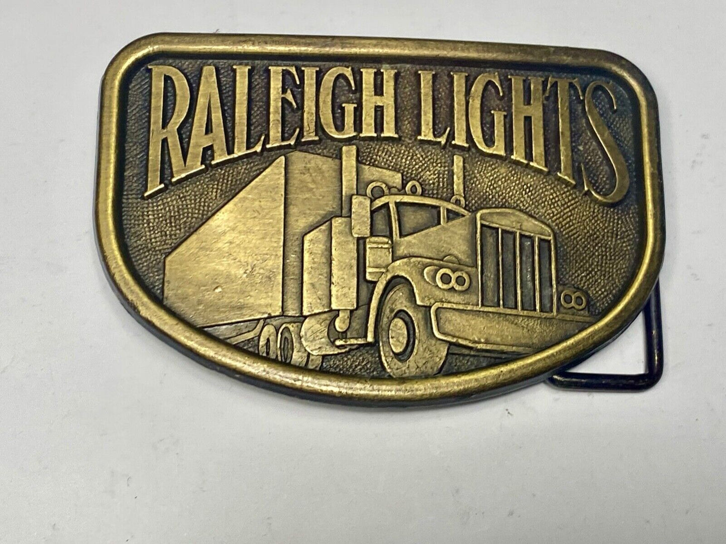 1970s Vintage Raleigh Lights Semi Truck Trucker Brass Tone Belt Buckle by RJ