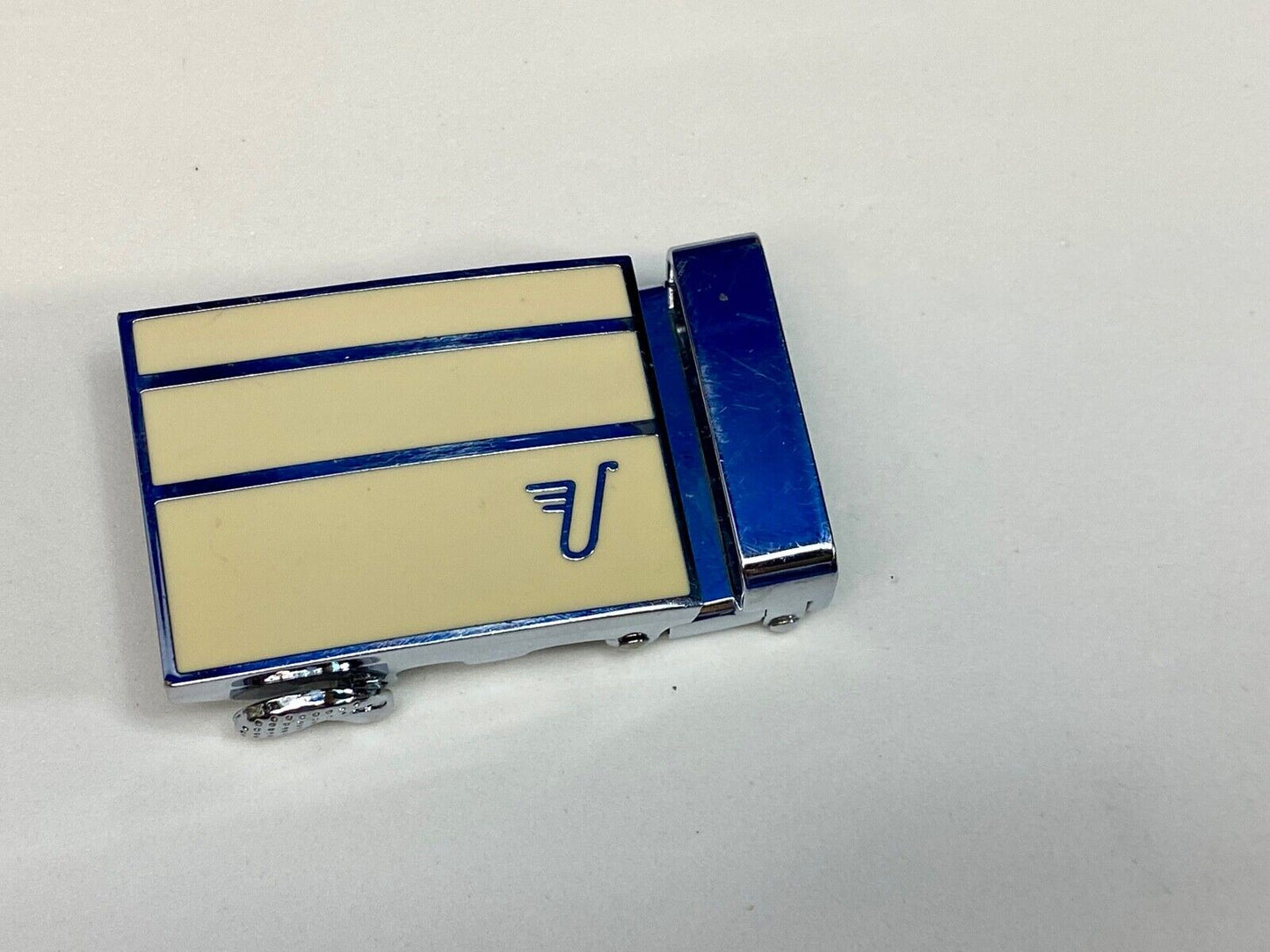 Unknown to me, Cream & silver color lines automatic slide belt buckle   U?  V?  