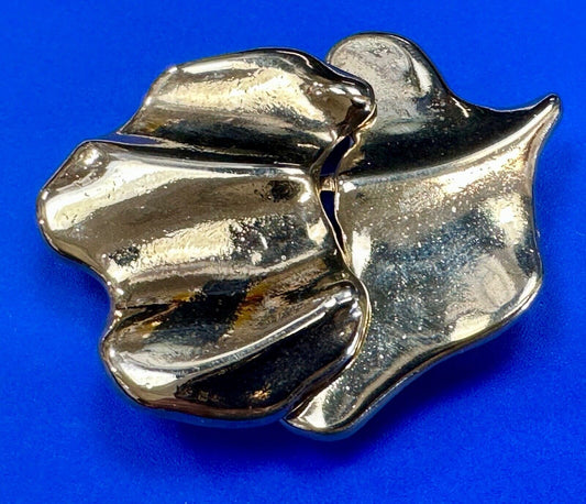 Two-piece interlocking gold tone leaf swirl theme belt slide buckle signed _____