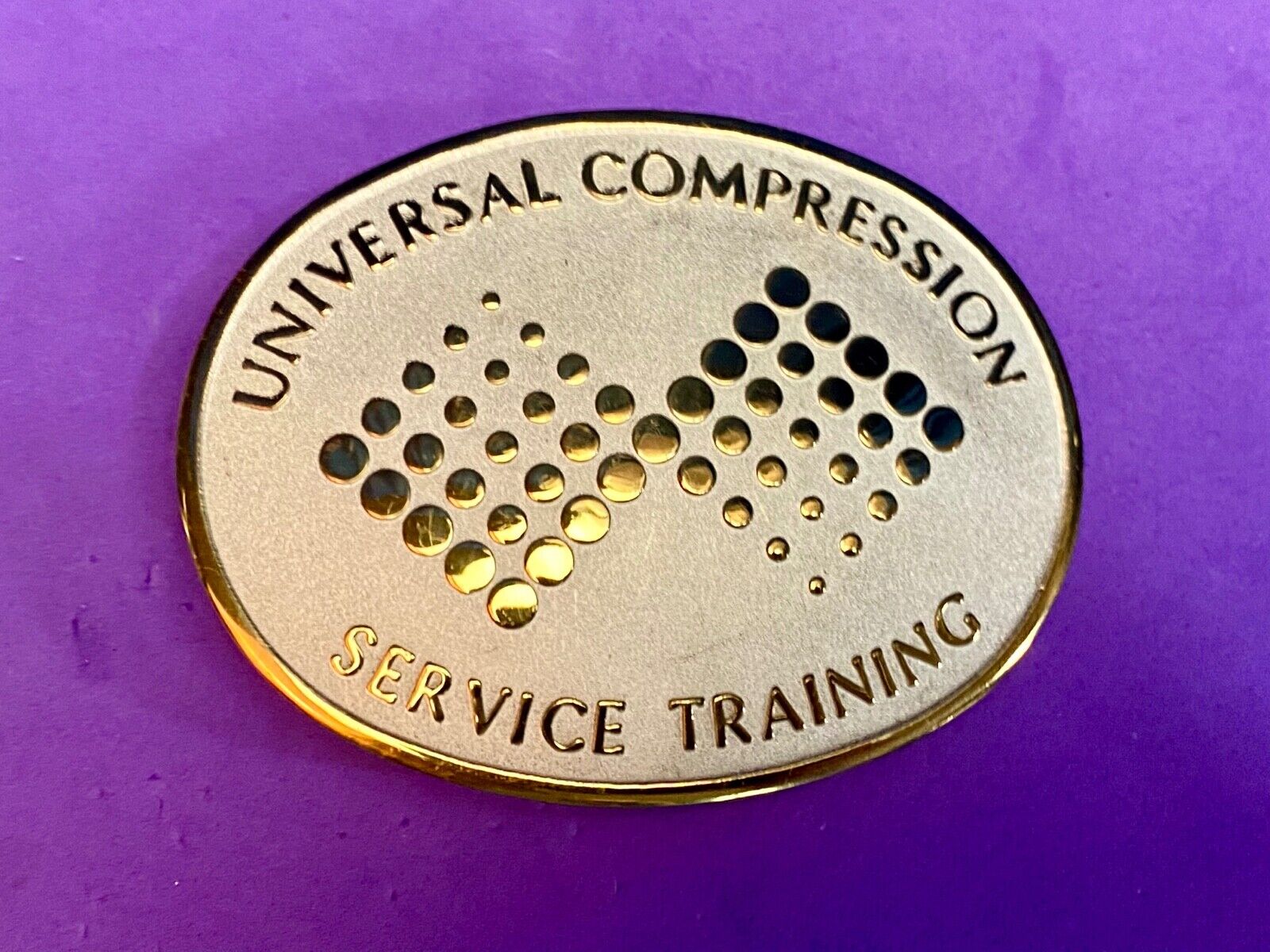 Universal Compression Service Training Company Award Belt Buckle