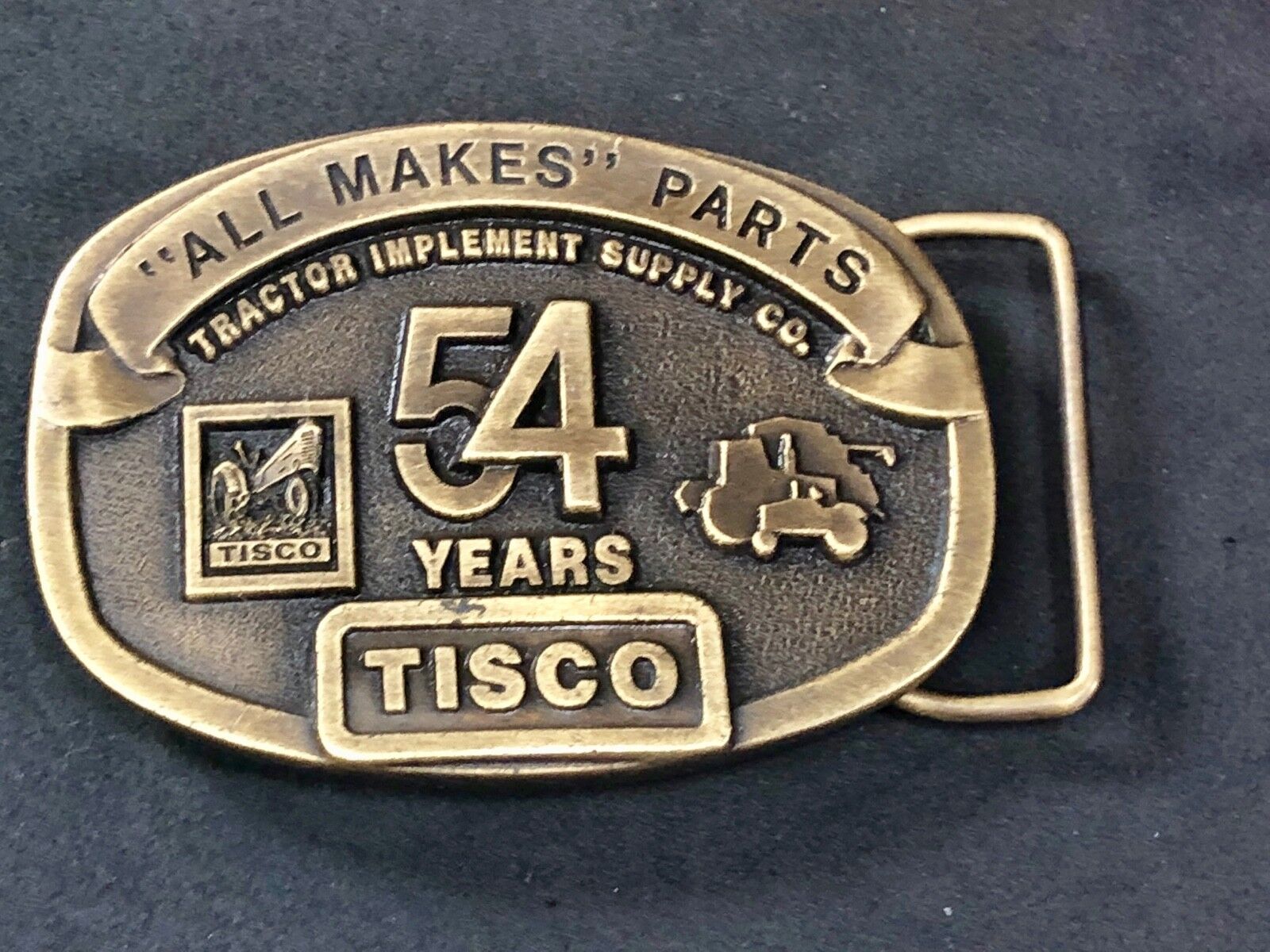 Vintage 1991 Tisco All makes Parts  - tractor supply farm  54 years belt buckle 