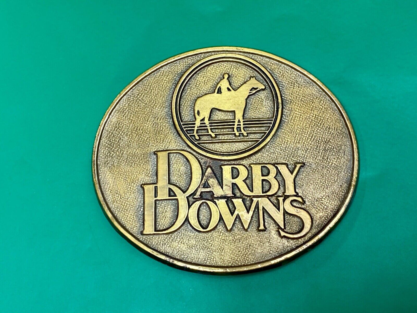 VINTAGE 1970s DARBY DOWNS HORSE RACETRACK BRASS TONE BELT BUCKLE by RJ