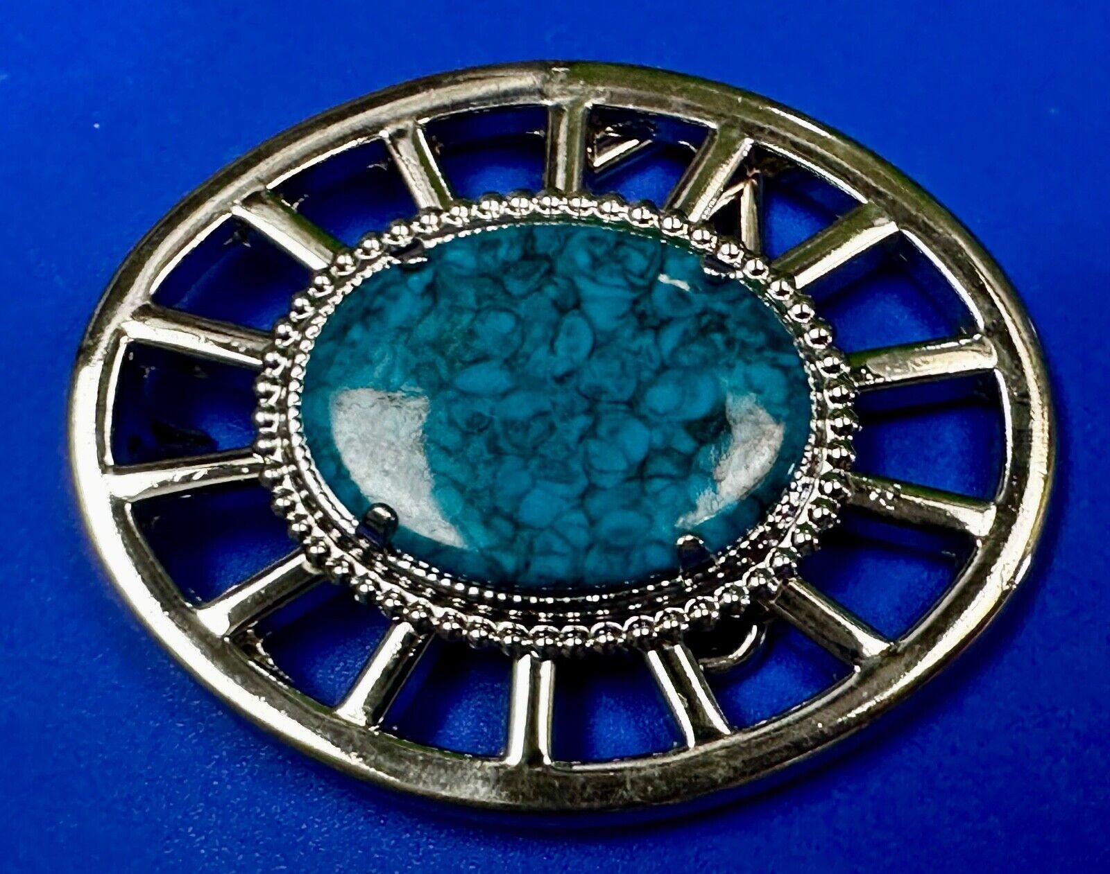 Synthetic Turquoise in unique see through silver tone round Belt Buckle