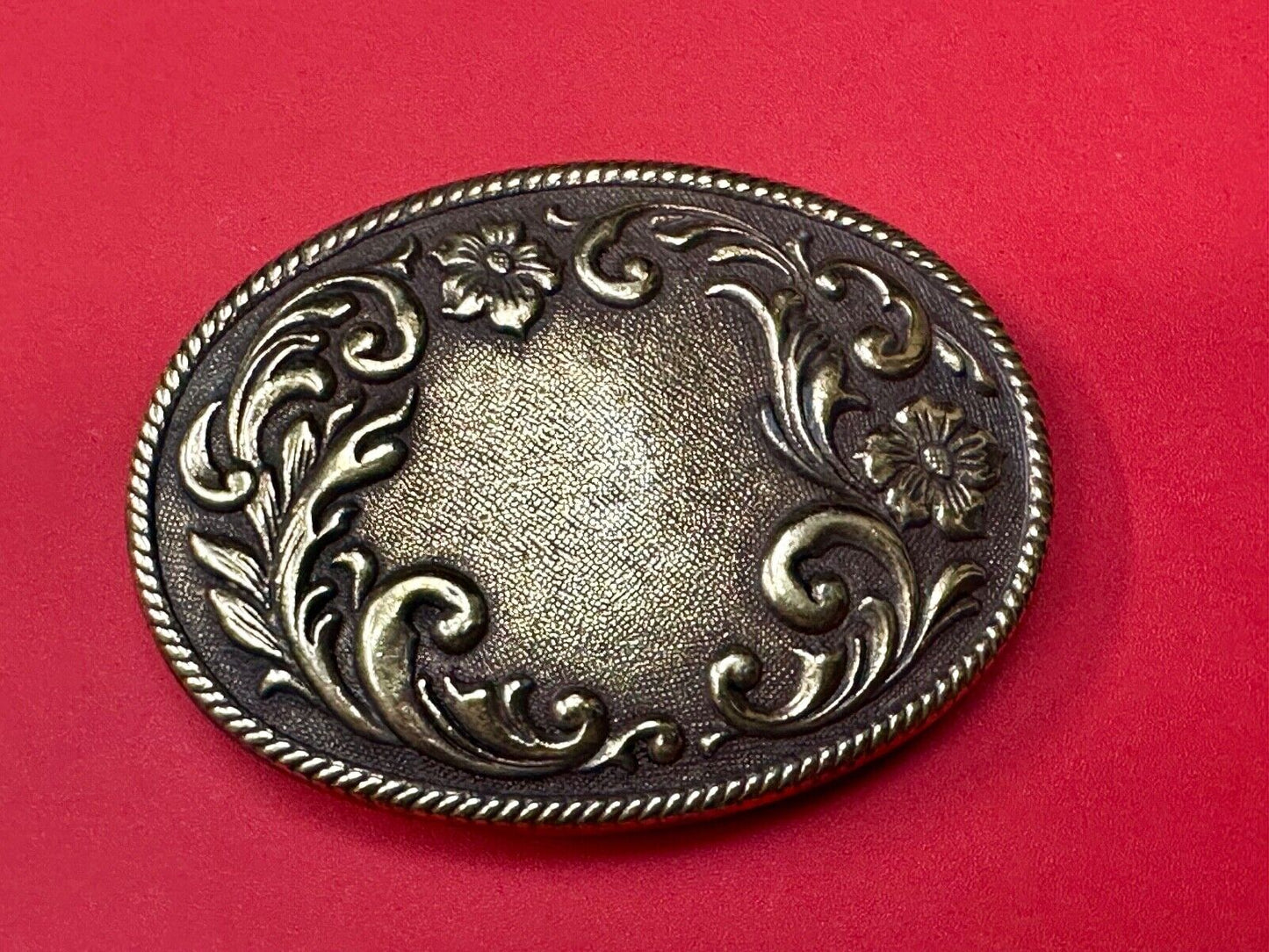 USA made vintage western flower swirl design oval belt buckle marked W