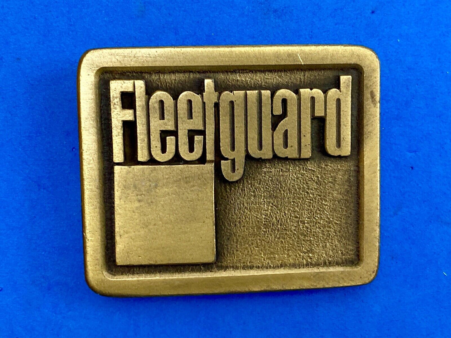 Vintage Fleetguard Construction Equipment Company Advertising Belt Buckle 