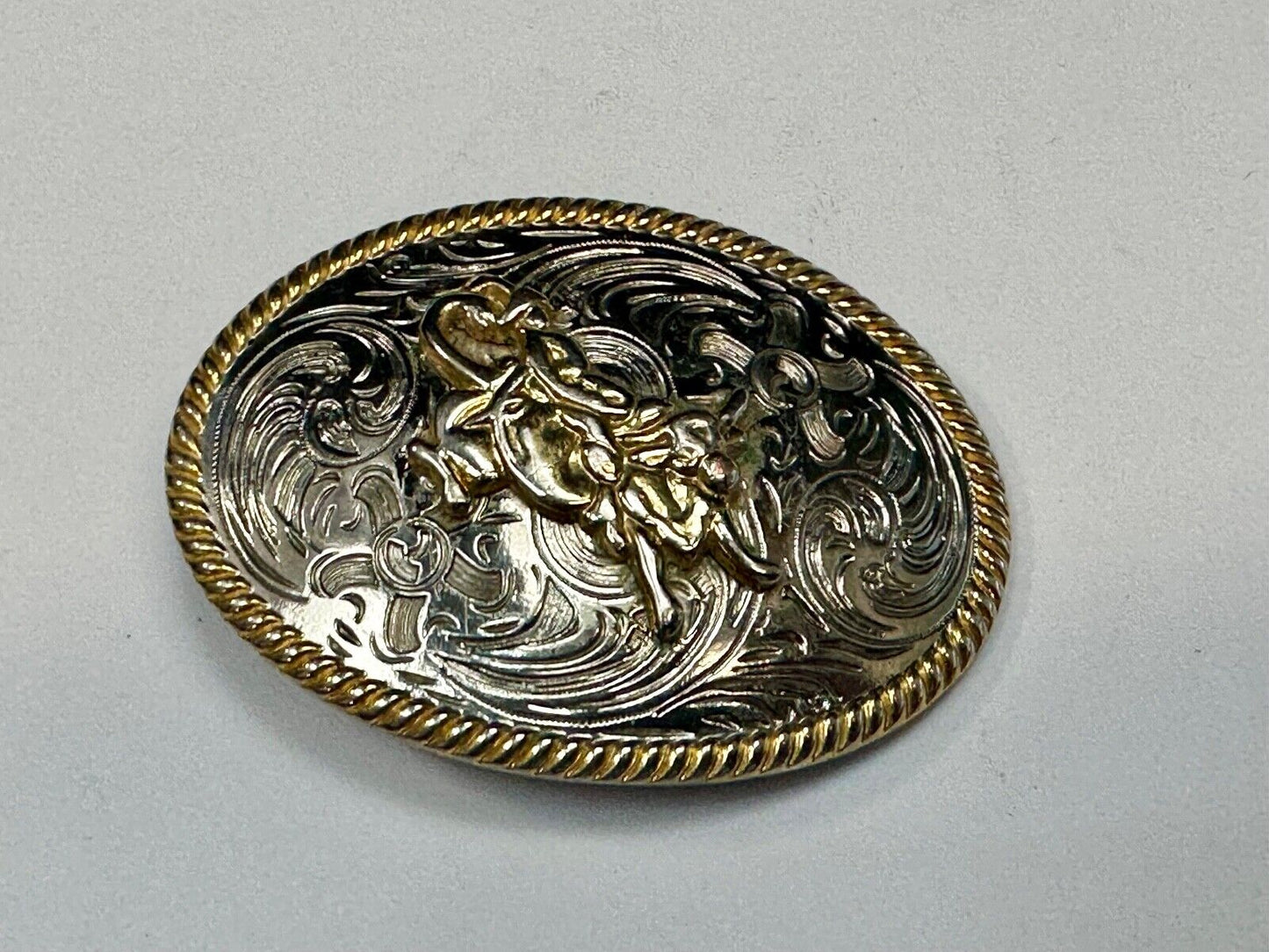 2.5" wide Two tone Vintage western rodeo cowboy belt buckle.