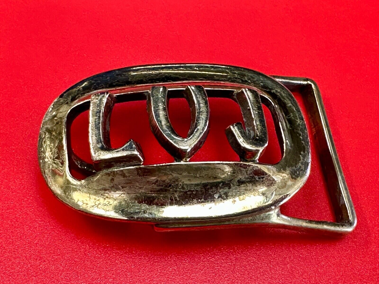 Vintage LVJ LUJ gold tone block letters cutout belt buckle