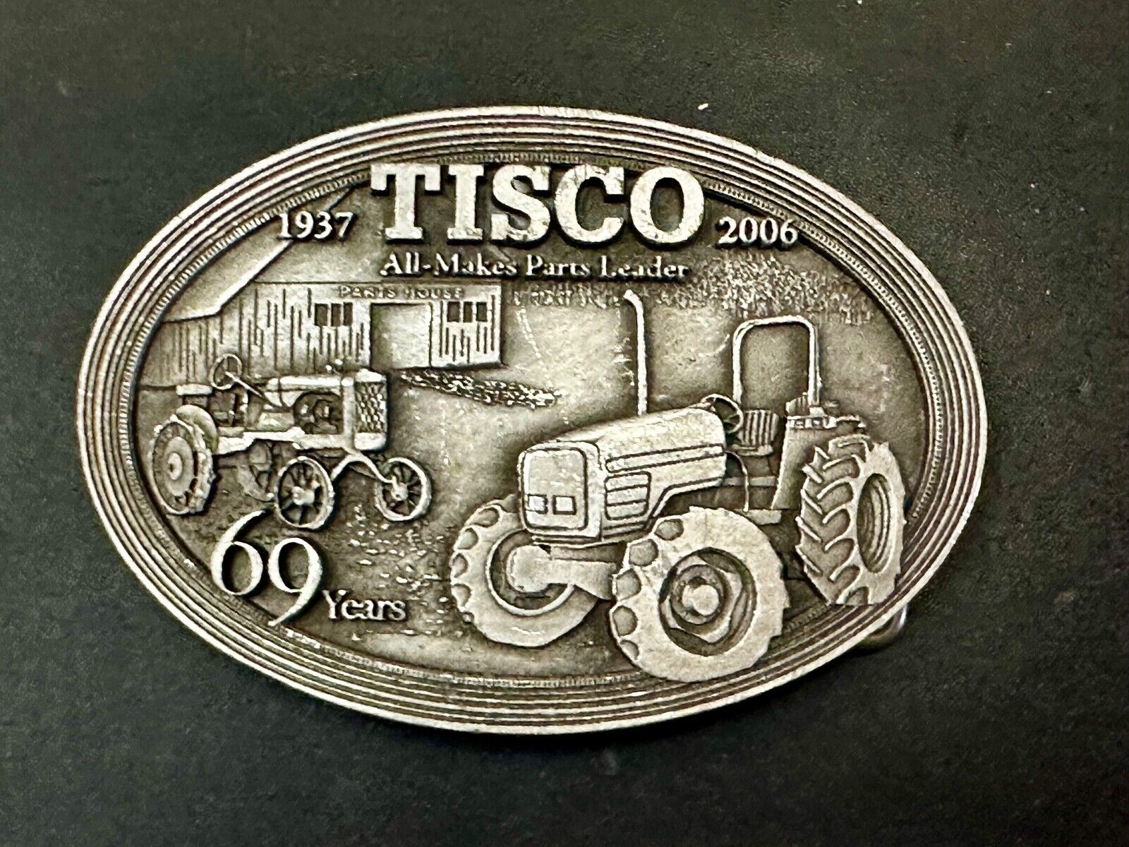 TISCO Tractor Implement Supply Replacement Parts 69 years - 2006 Belt Buckle