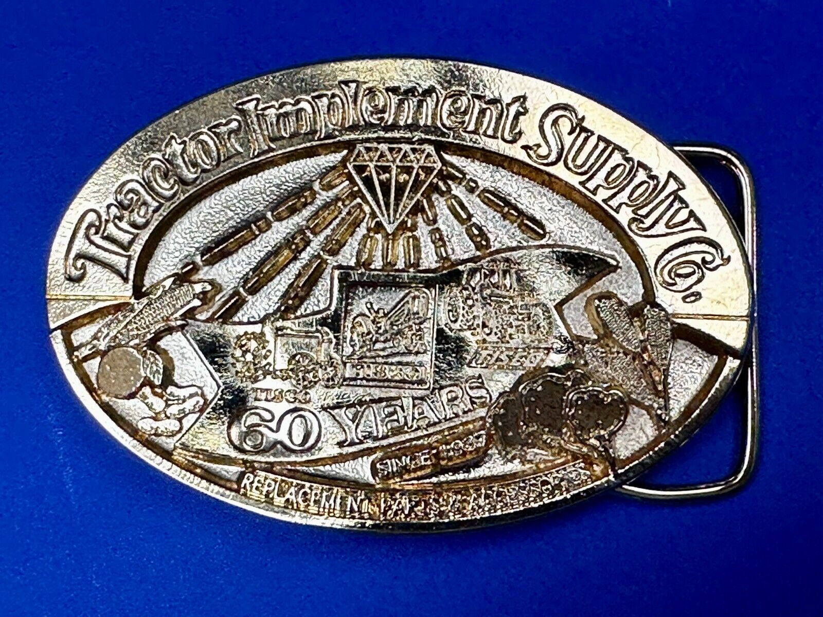 60 years TISCO Tractor Implement Supply company Vintage Belt Buckle by Speccast