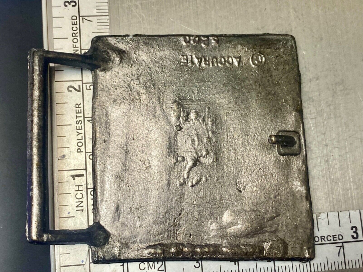 Two Tribal Warriors Indian figures?  accoral marked numbered belt buckle