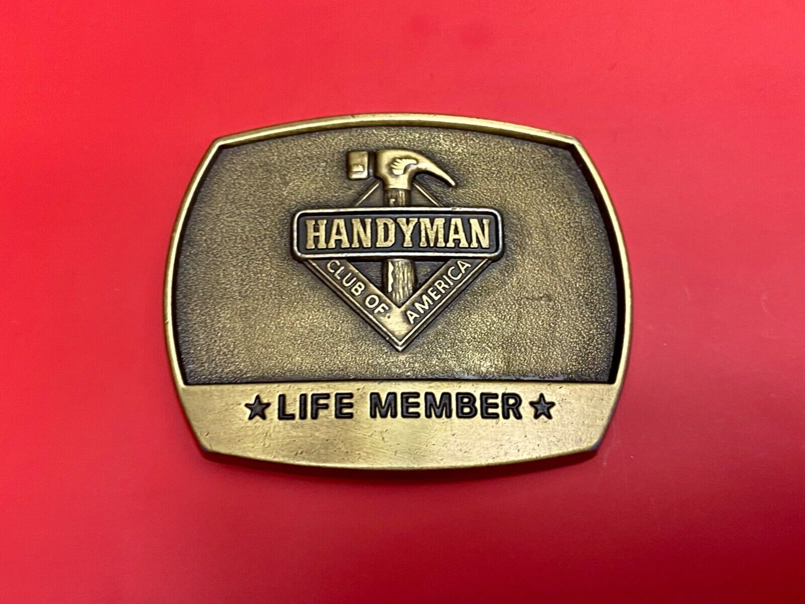 vintage handyman club of America Hammer Ruler- life member belt buckle