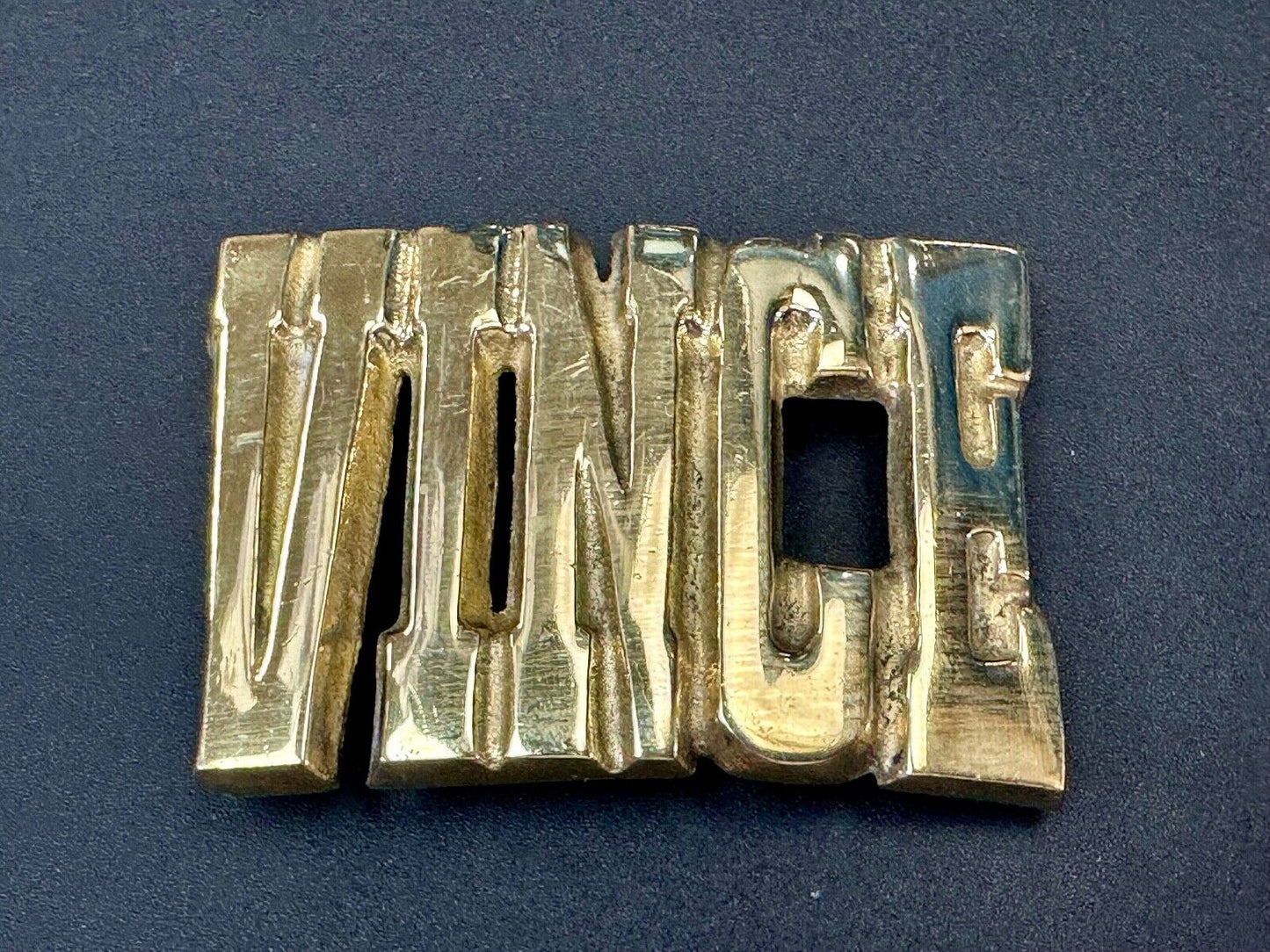 Vince,  Cutout block letters solid brass Vintage belt buckle marked Taiwan ROC