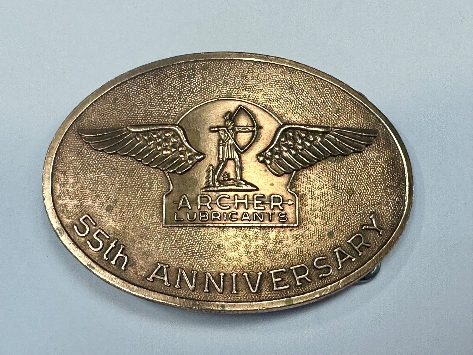 Archer Lubricants Omaha NE - Oil for farmers ranchers belt buckle