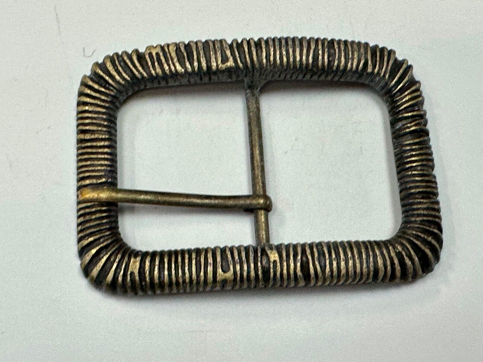 Unique Center Bar Spring abstracted wrapped style rectangular belt buckle