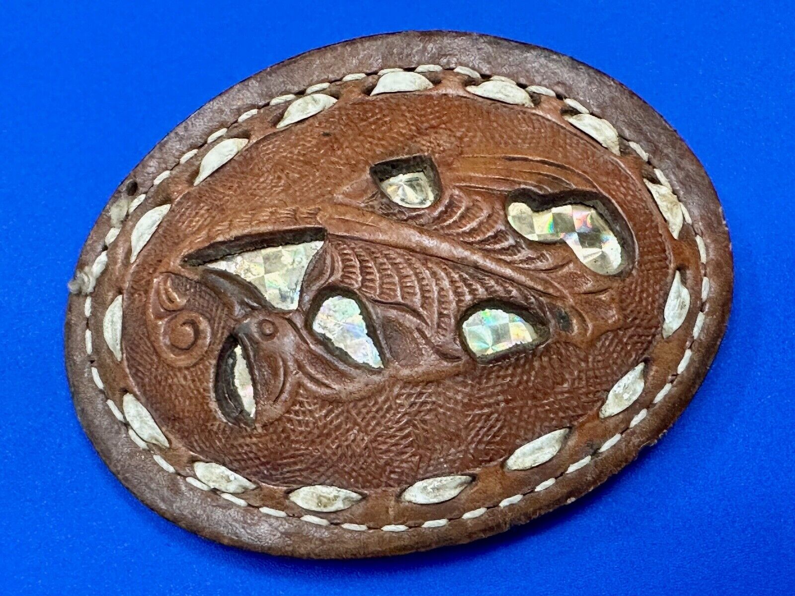 Unique leaf pattern in leather belt buckle made of Abalone shell