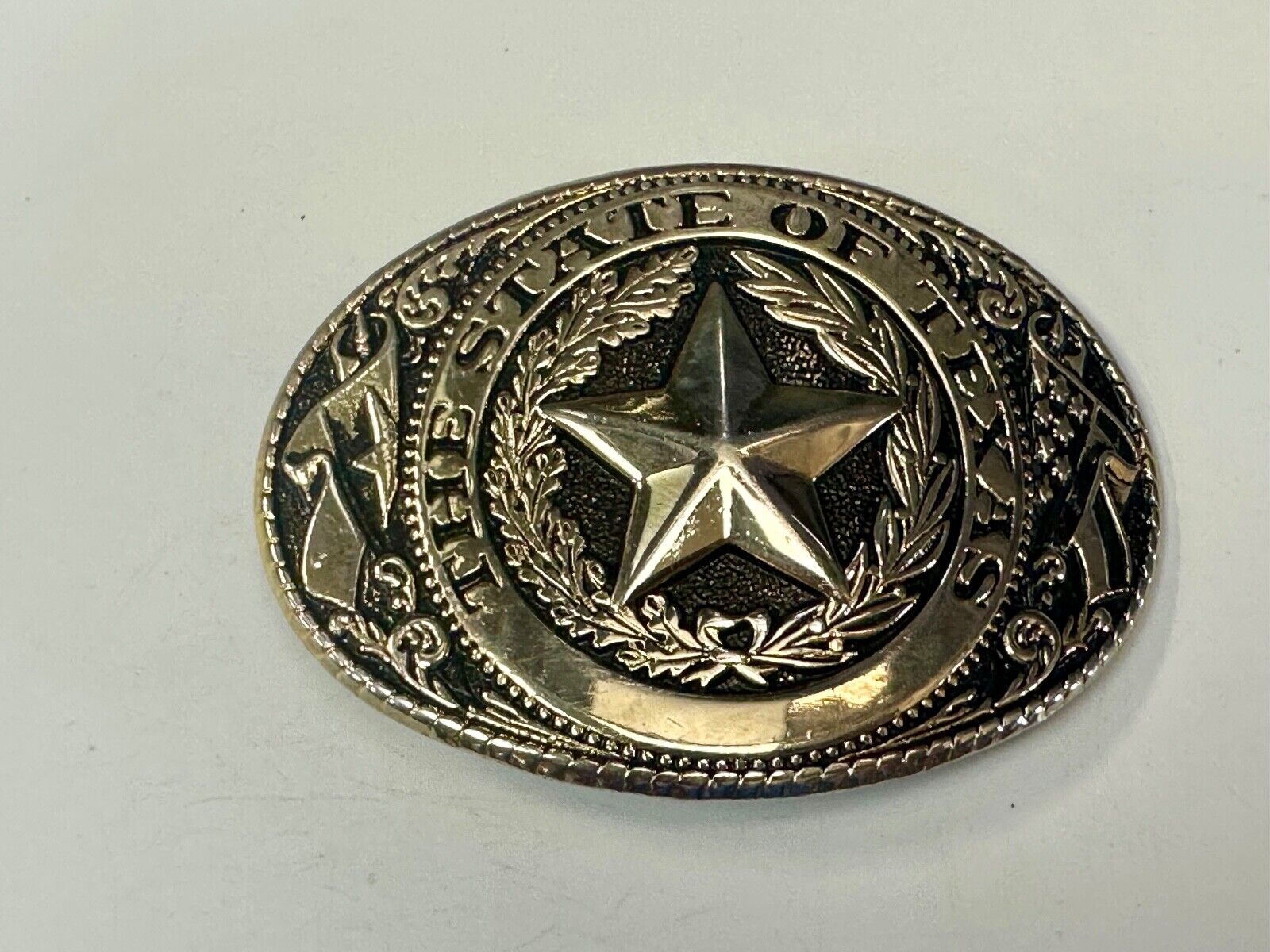 The Great State of Texas Star & Flag gold & black color USA made belt buckle