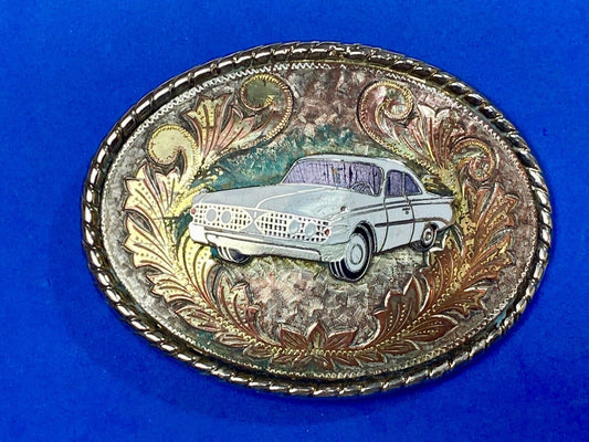 A custom Pimped out retro 70's Car - a caddy? on a western belt buckle signed W!