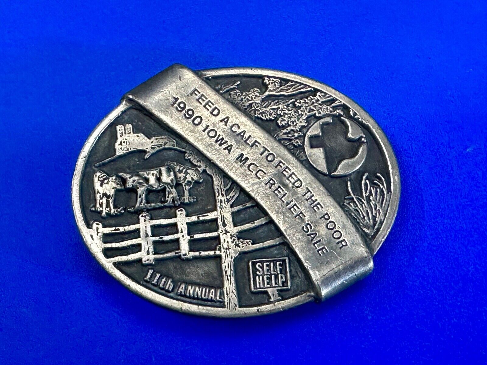 1990 Iowa MCC rebuff sale- Feed Calf to feed the poor belt buckle