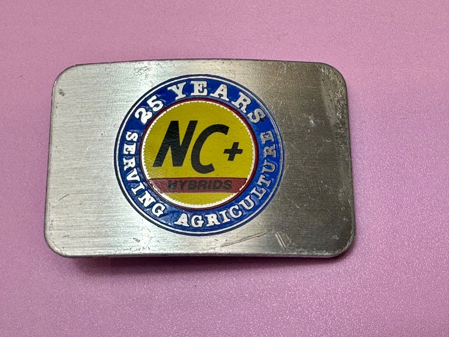 25 years serving agriculture - NC+ Hybrids Farmers Agriculture belt buckle