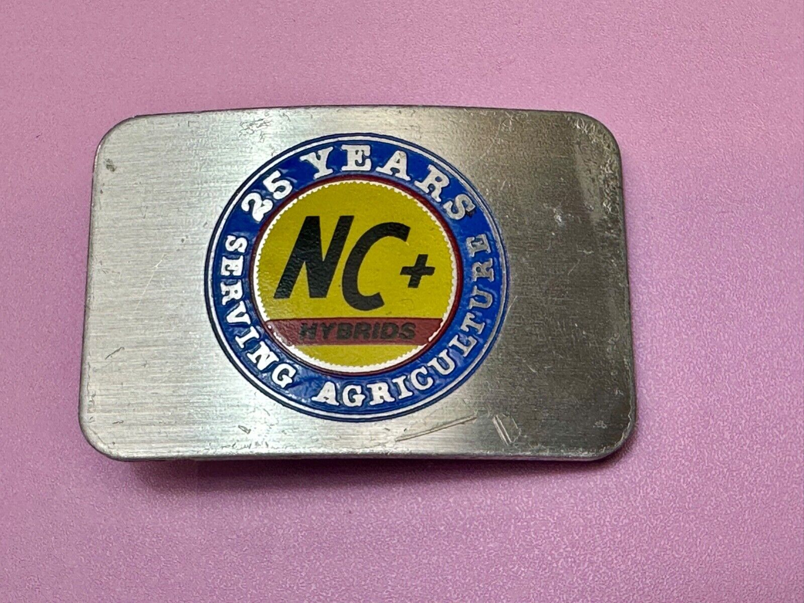 25 years serving agriculture - NC+ Hybrids Farmers Agriculture belt buckle