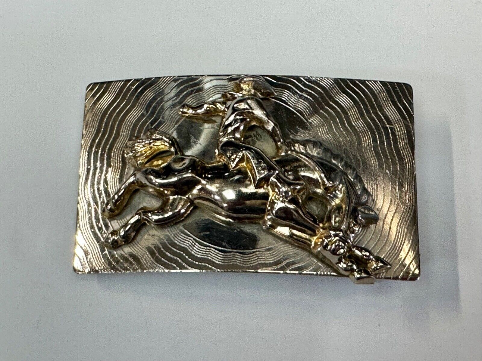Trippy! Cowboy Saddle Bronc Horse Rider western Impact style belt buckle. - RARE