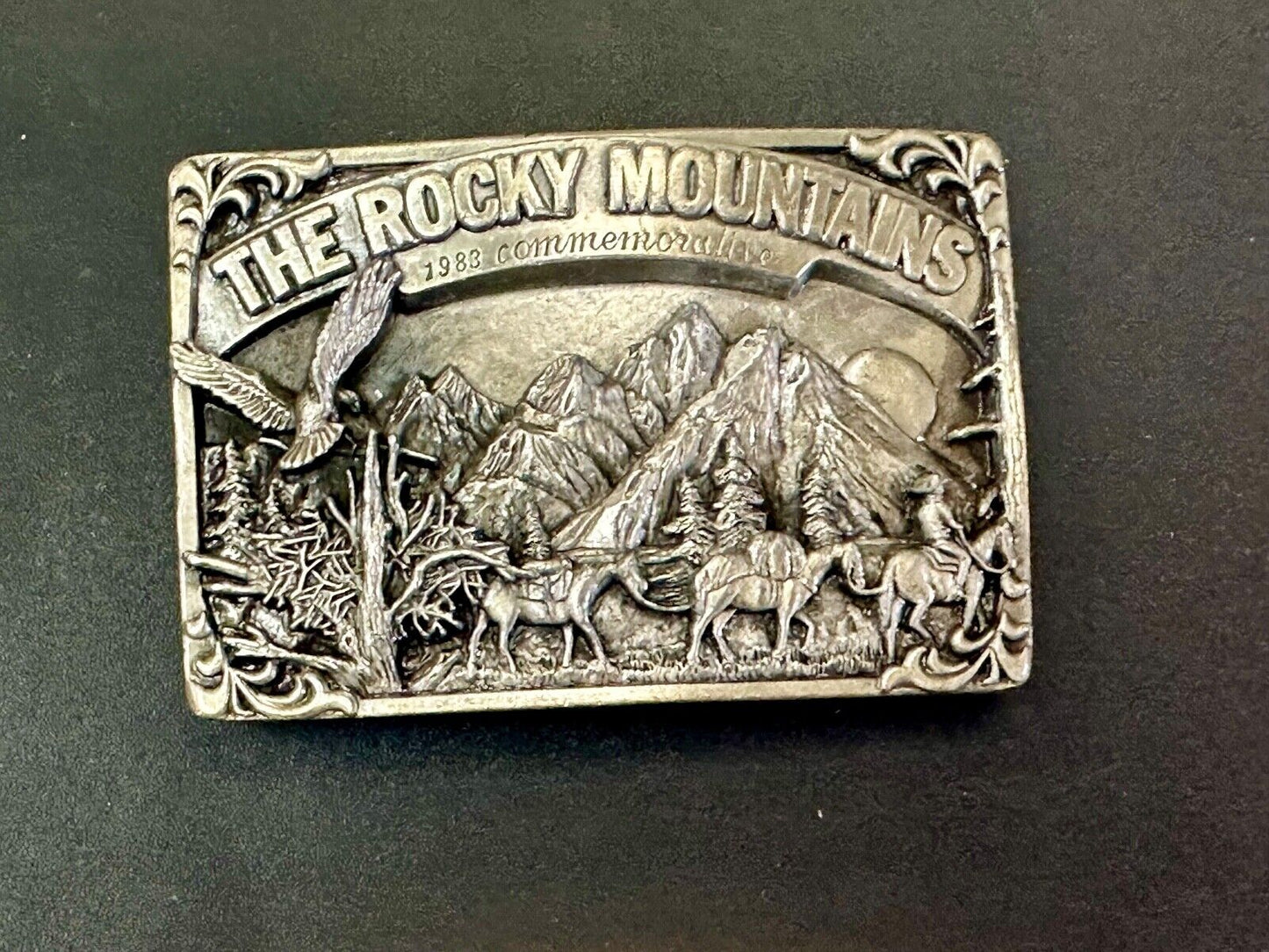 THE ROCKY MOUNTAINS** COMMEMORATIVE BELT BUCKLE VINTAGE 1983 BELT BUCKLE