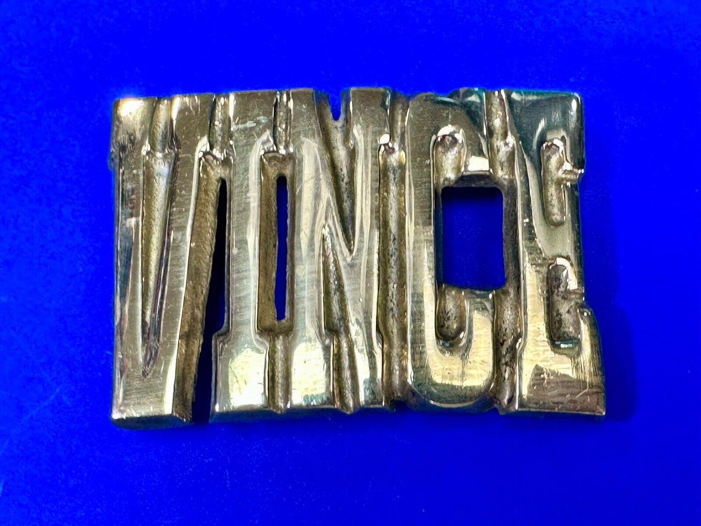 Vince,  Cutout block letters solid brass Vintage belt buckle marked Taiwan ROC