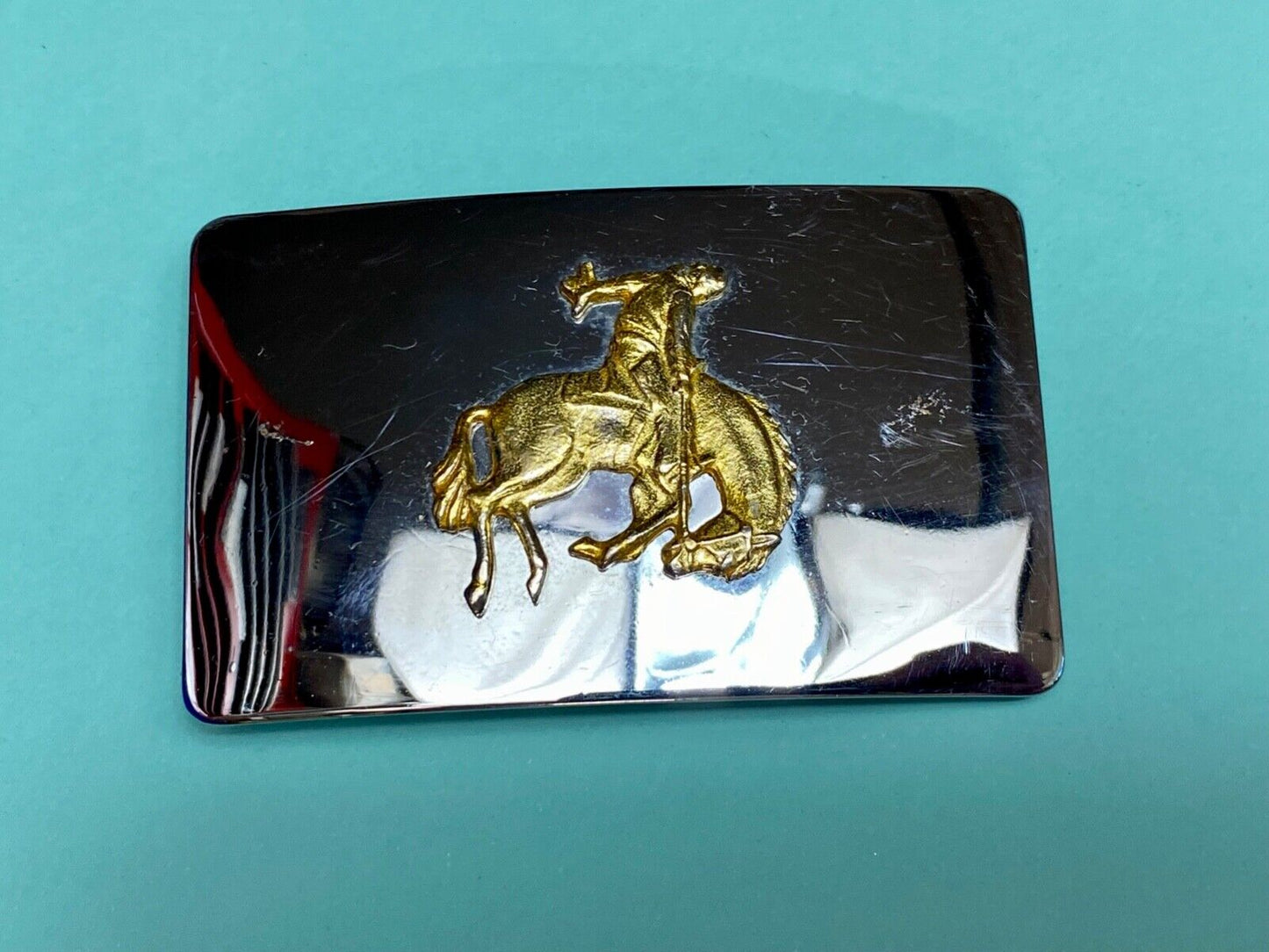 Vintage Lyn Tone Co Reflective  Saddle Bronc Rider two tone belt buckle