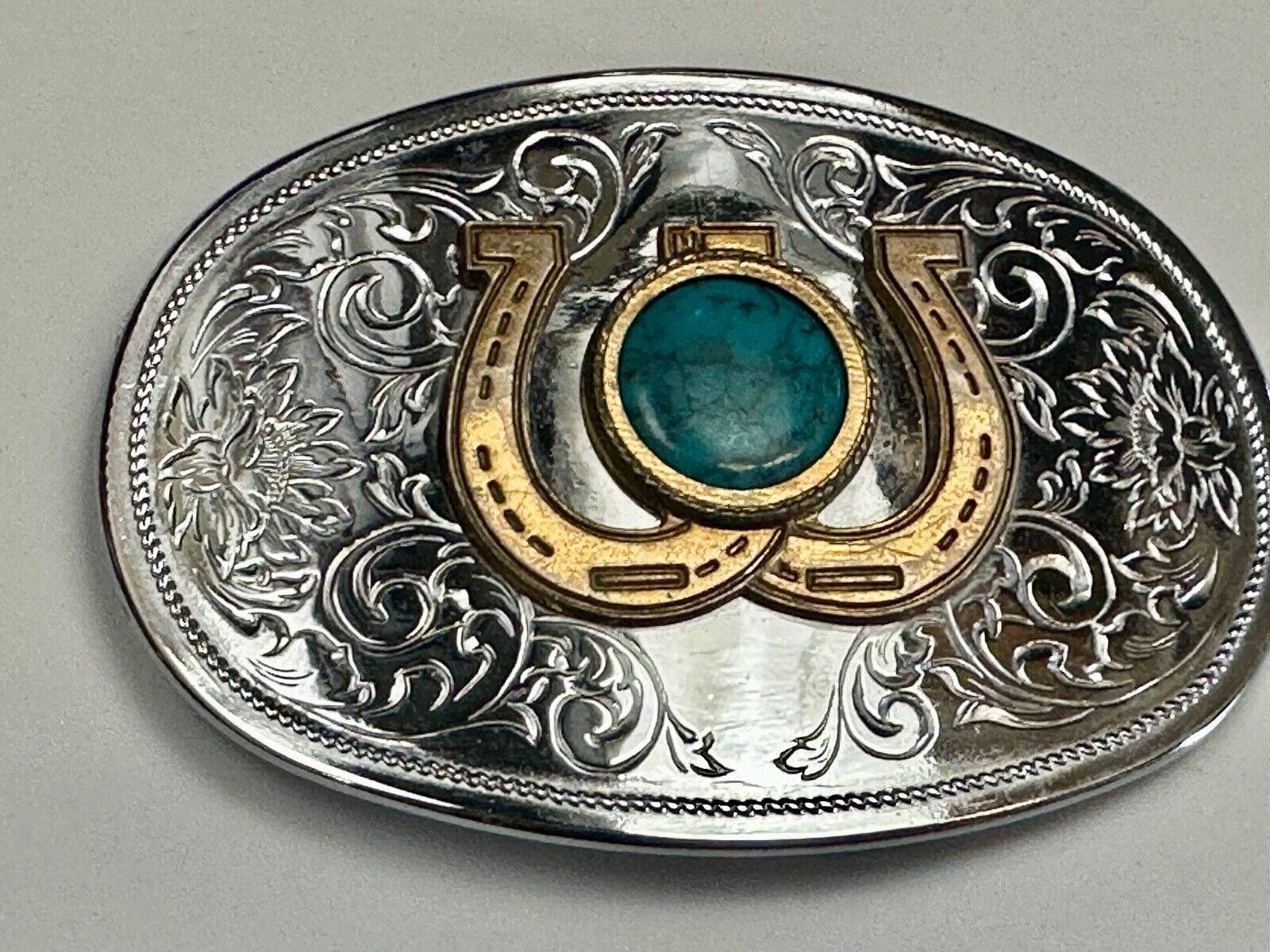 Turquoise centerpiece in  lucky horseshoe - two tone reflective belt buckle