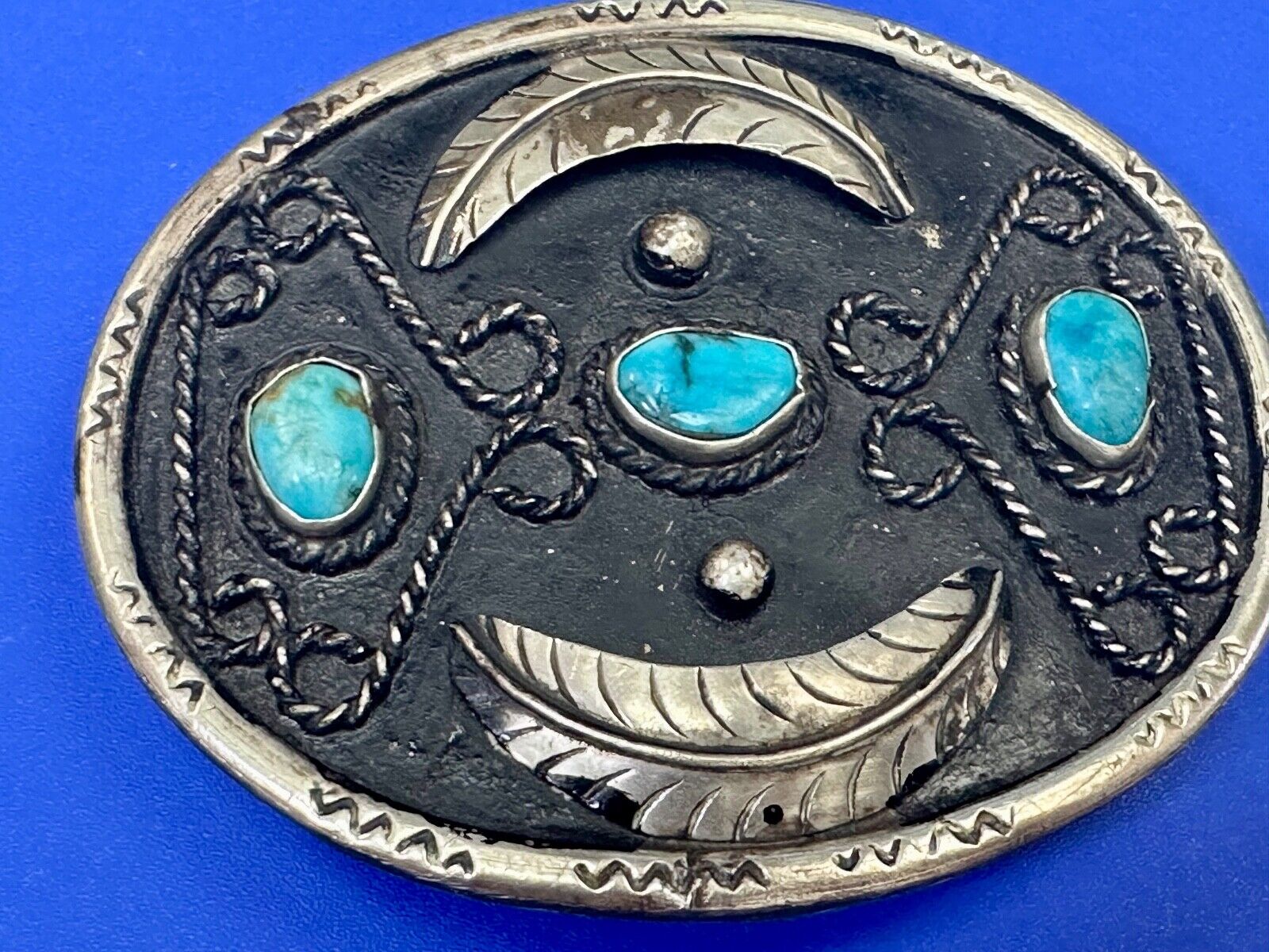 Turquoise stones raised feathers vintage belt buckle marked Sterling 0925 Mexico