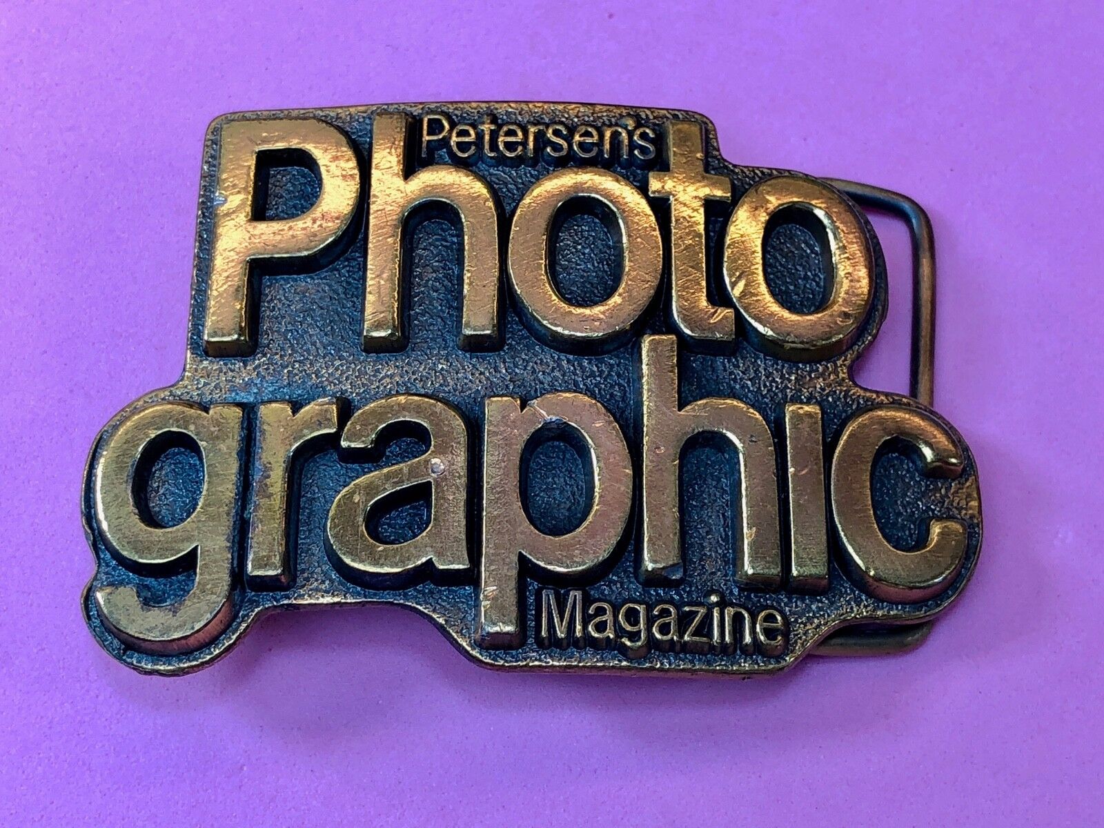 Vintage 1970’s. Petersens PHOTO GRAPHIC Magazine Advertising Logo Belt Buckle 