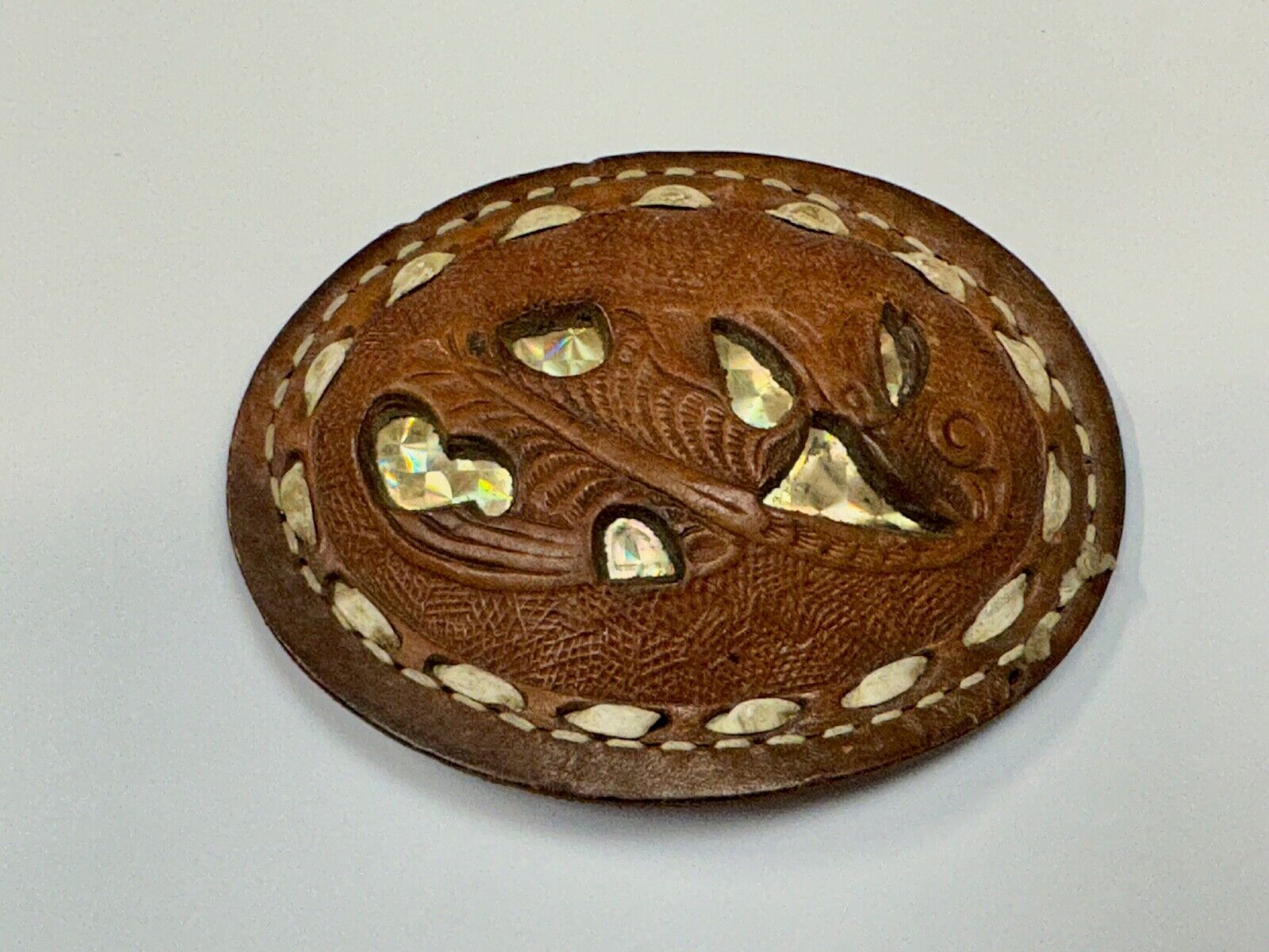 Unique leaf pattern in leather belt buckle made of Abalone shell