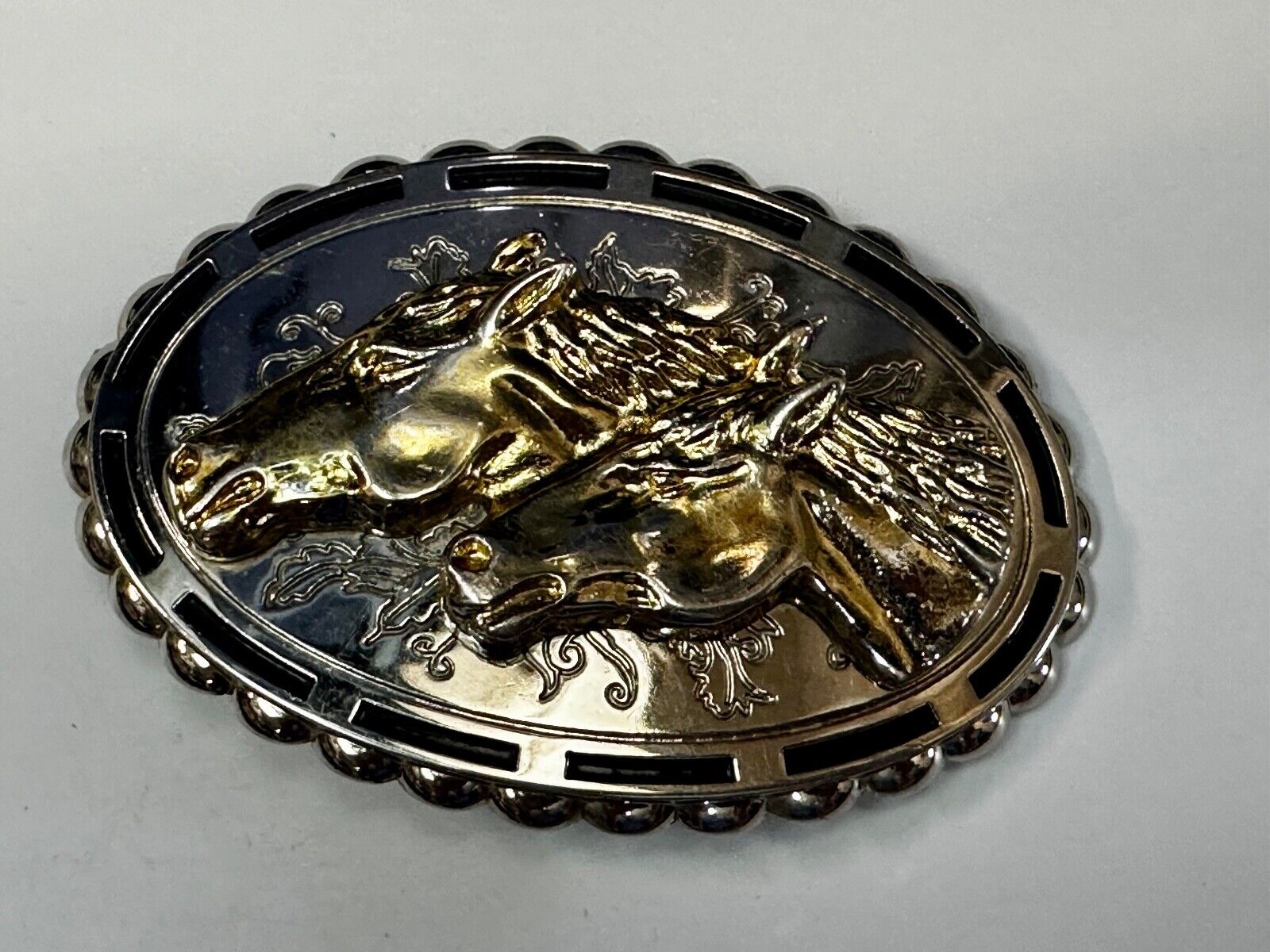 Two horse heads - Vintage two tone oval Belt Buckle with reflective backing