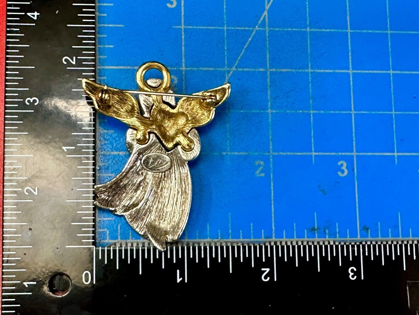 Angle holding heart -vintage two tone LC Liz Claiborne Signed Brooch Pin