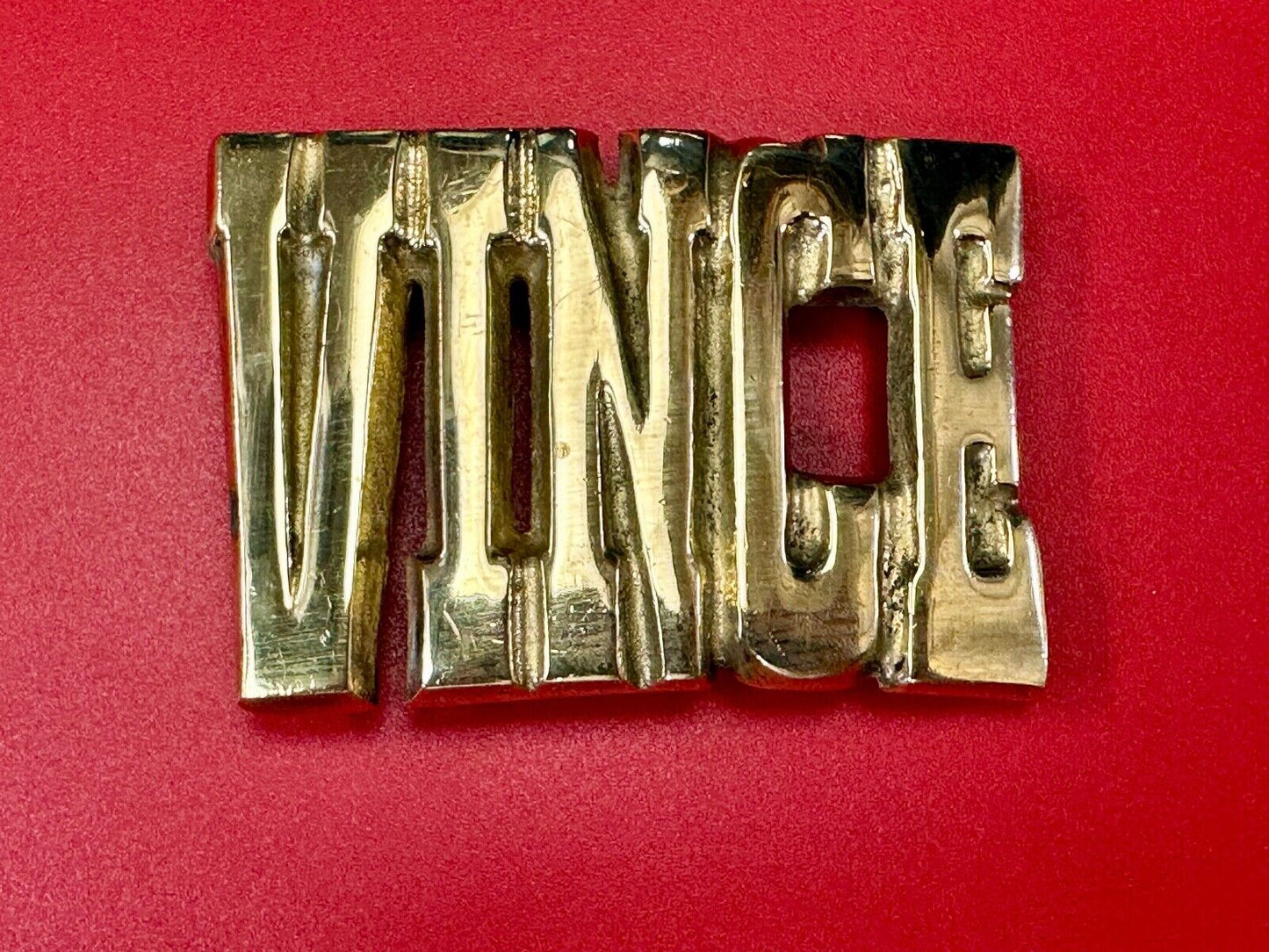 Vince,  Cutout block letters solid brass Vintage belt buckle marked Taiwan ROC