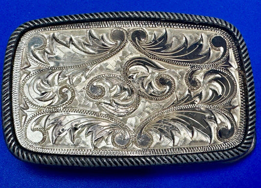Vintage flower theme etched oval western belt buckle W/ rope border