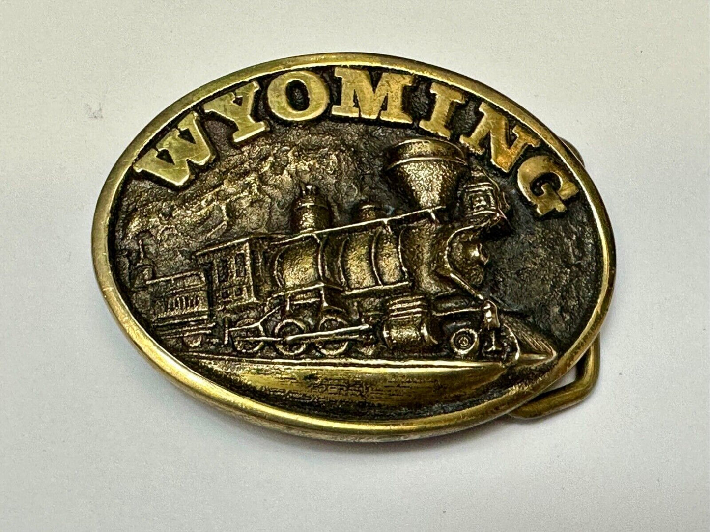 The great state of Wyoming Train History brass belt buckle by Heritage Mint LTD