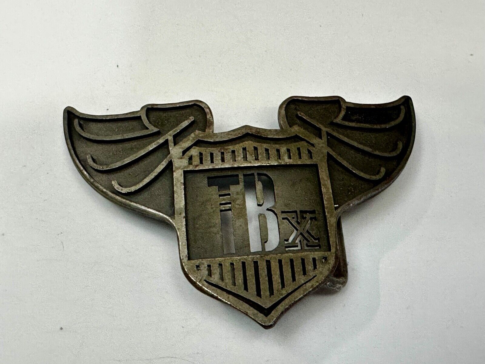 TBX Winged Bomb Vintage Silver Tone Cutout Belt Buckle