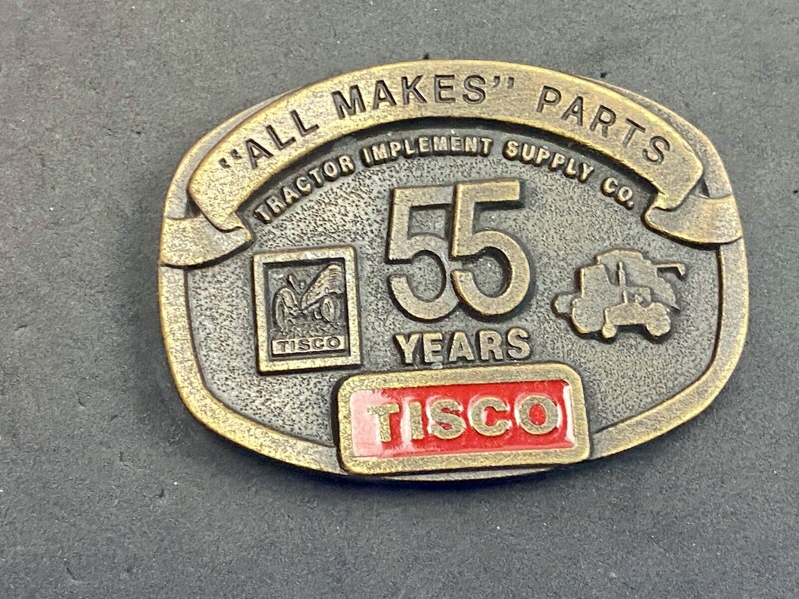55 years Tisco Tractor Implement Supply Spec Cast Brass Belt Buckle series 2