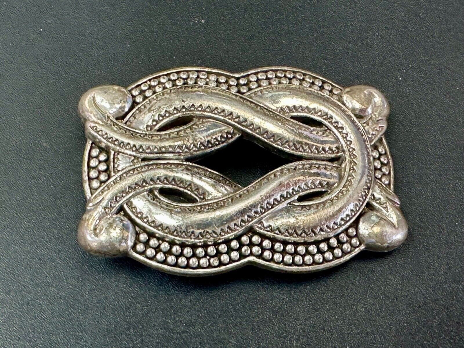 Vintage knot pattern see through silver tone belt buckle