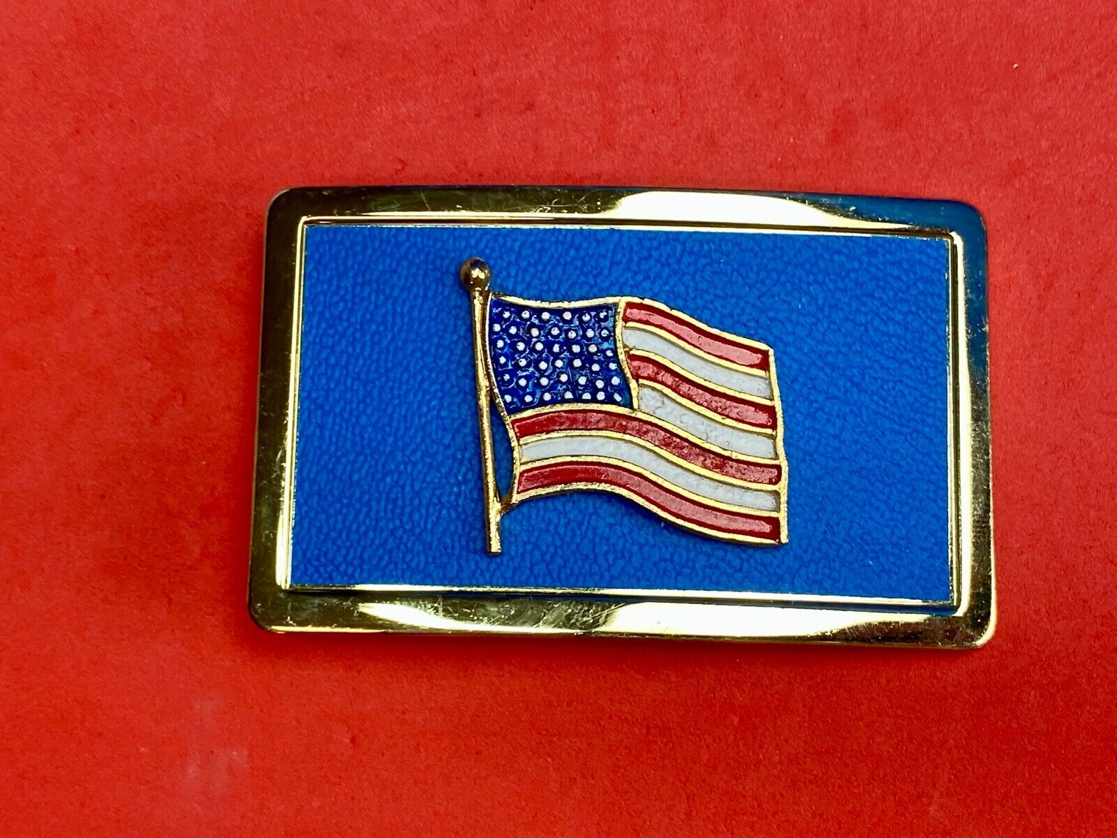 United States of America FLAG raised western belt buckle blue background 