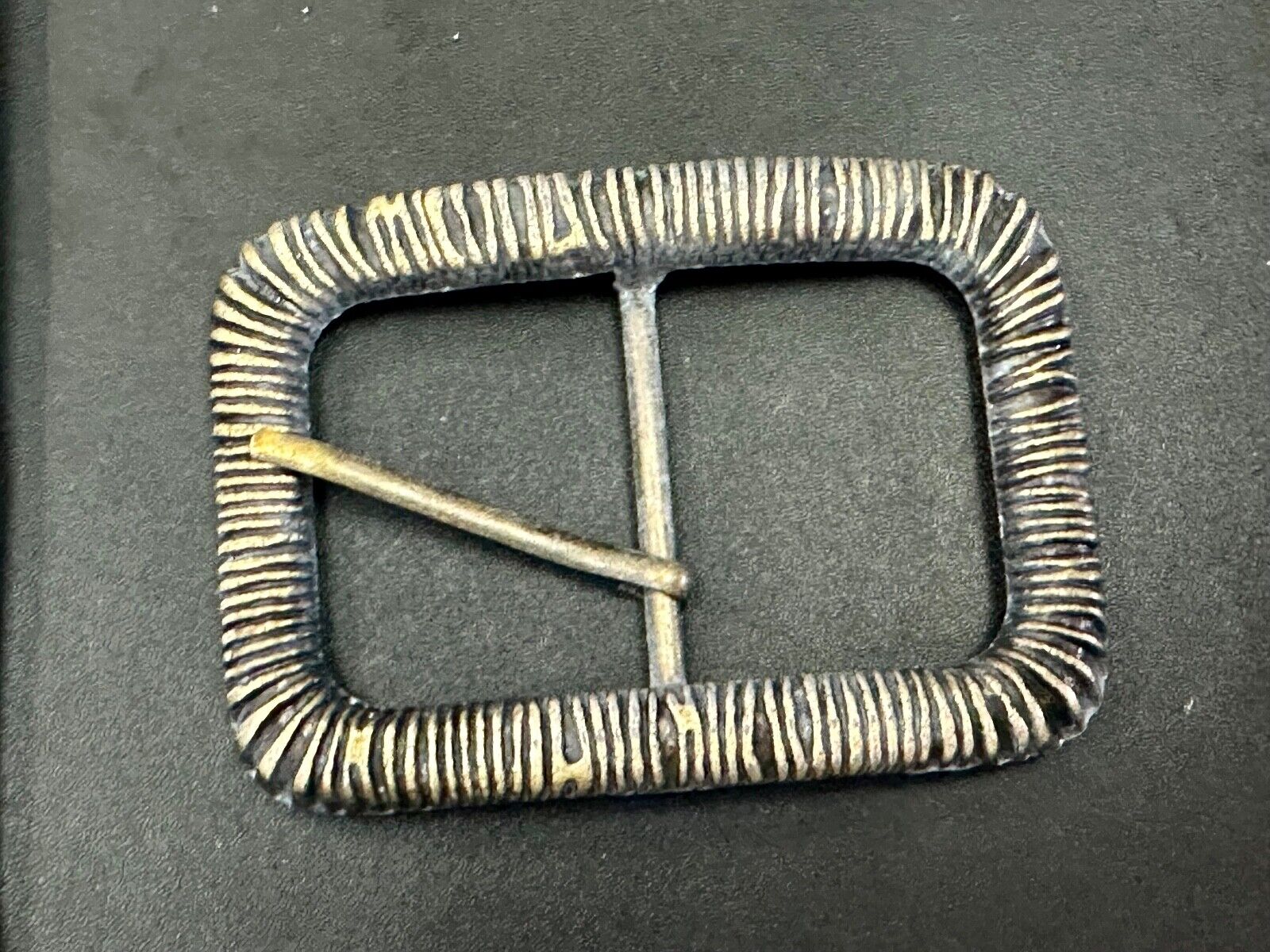 Unique Center Bar Spring abstracted wrapped style rectangular belt buckle