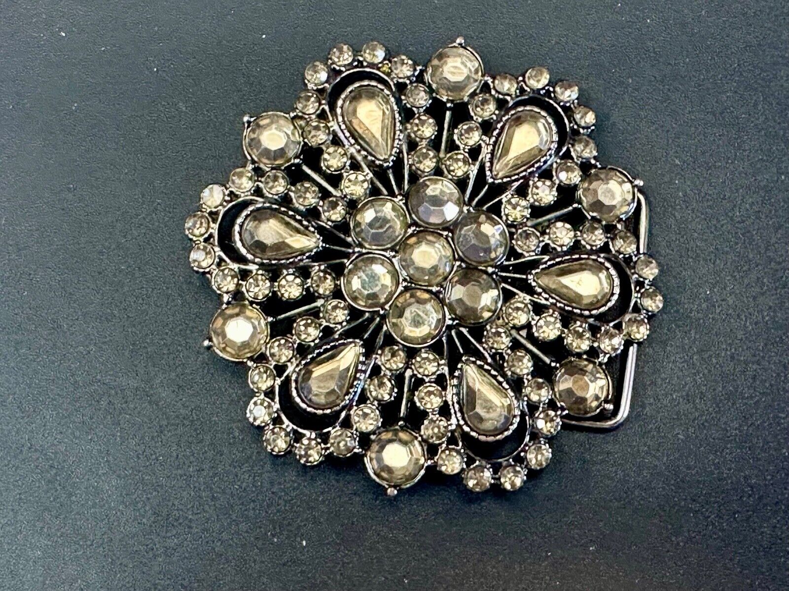 Vintage flowers star burst - multiple rhinestone's covering  belt buckle
