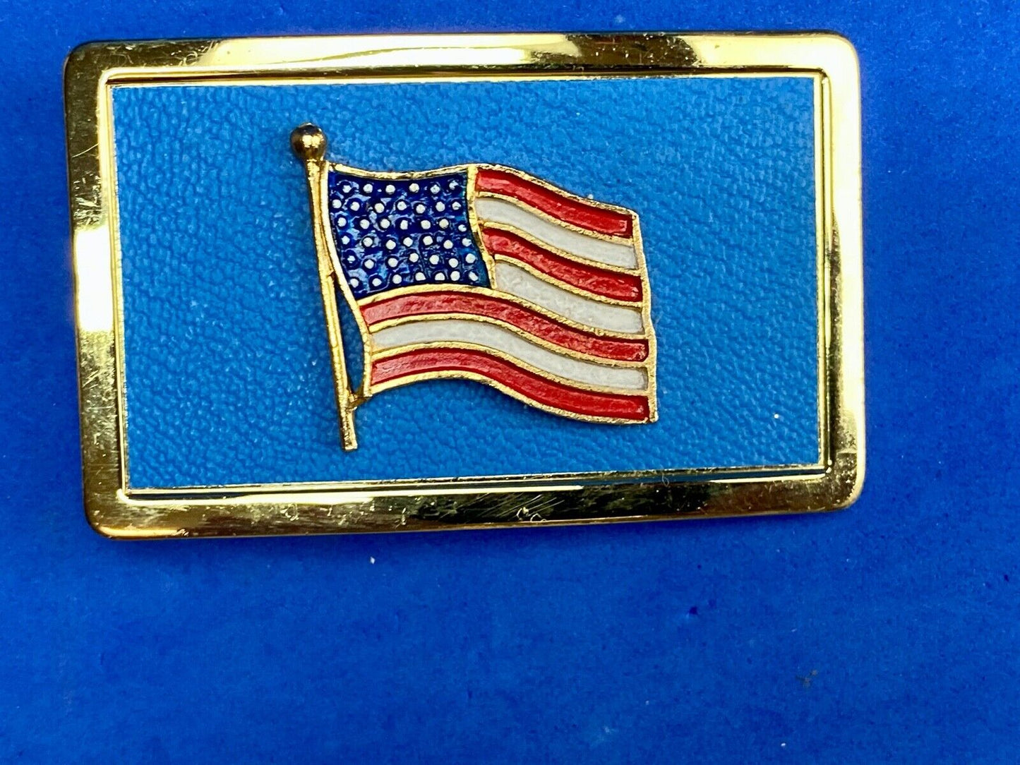 United States of America FLAG raised western belt buckle blue background 