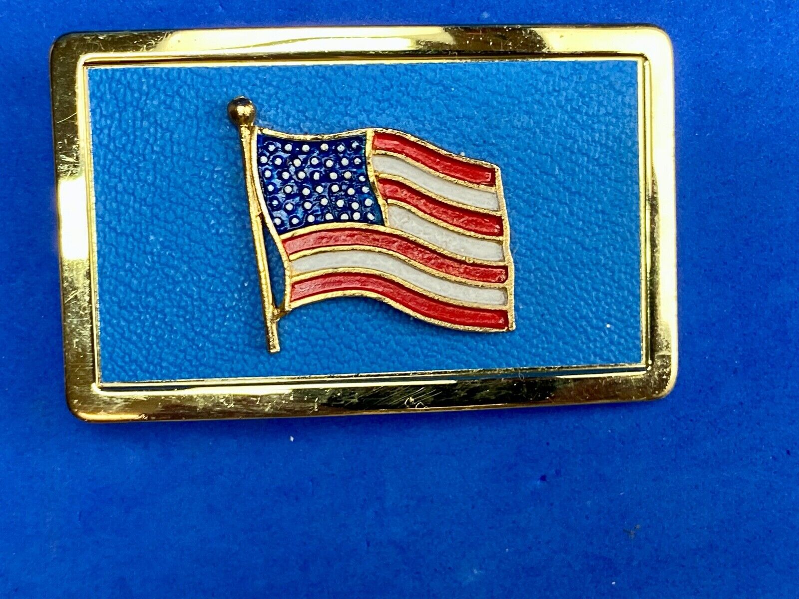 United States of America FLAG raised western belt buckle blue background 