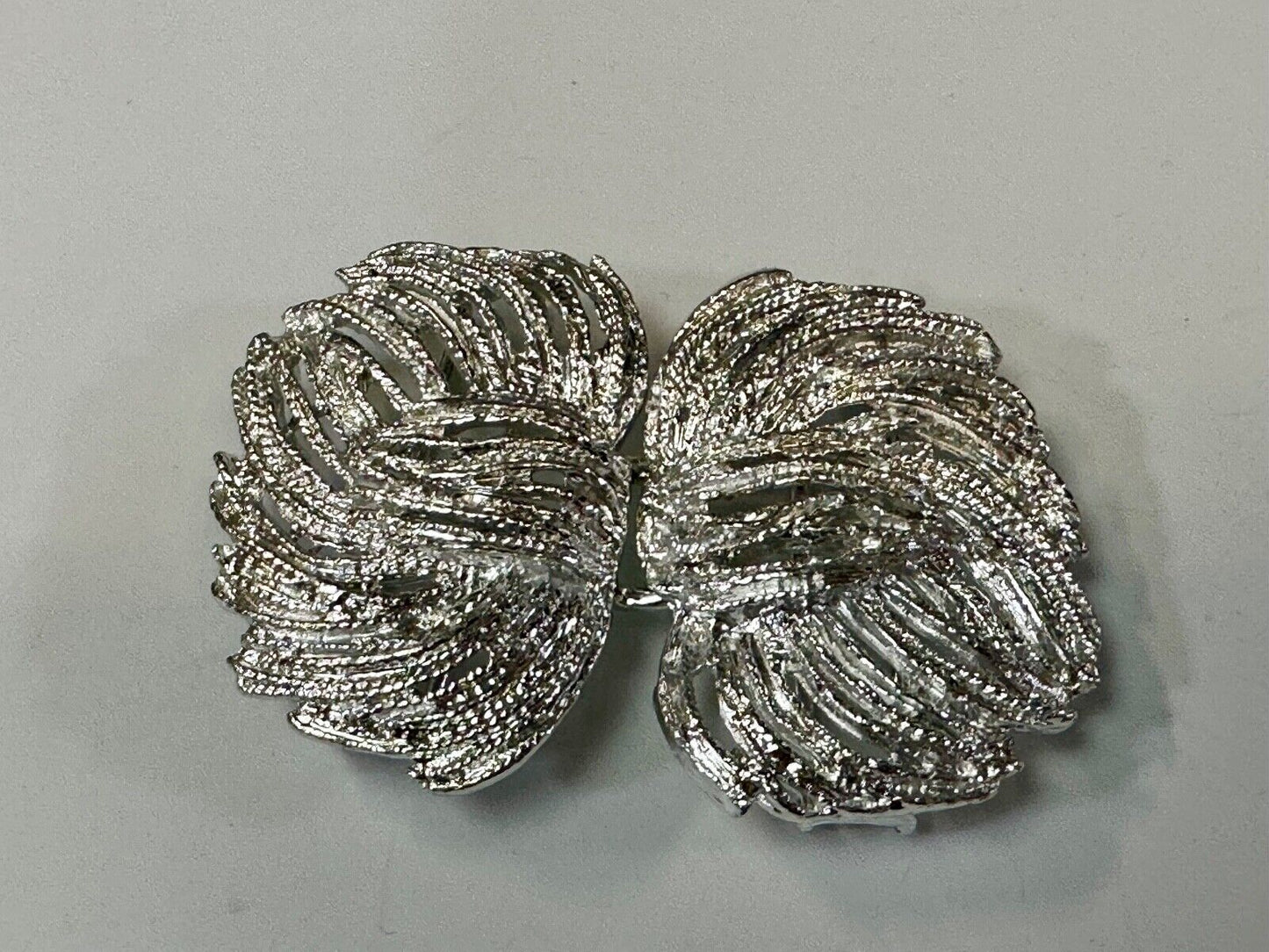 Two piece interlocking sea leaf brushed pattern see through pattern belt buckle
