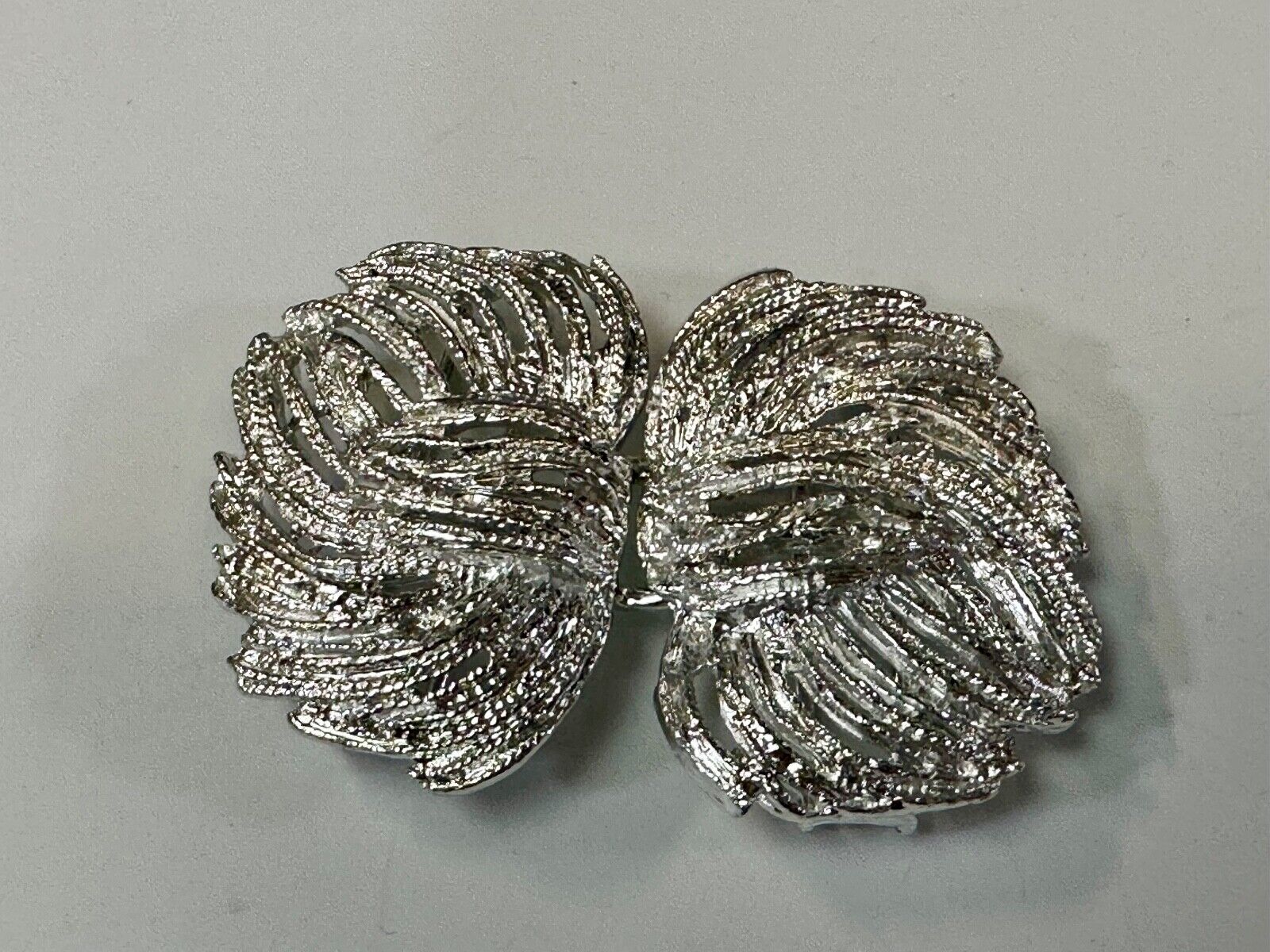 Two piece interlocking sea leaf brushed pattern see through pattern belt buckle