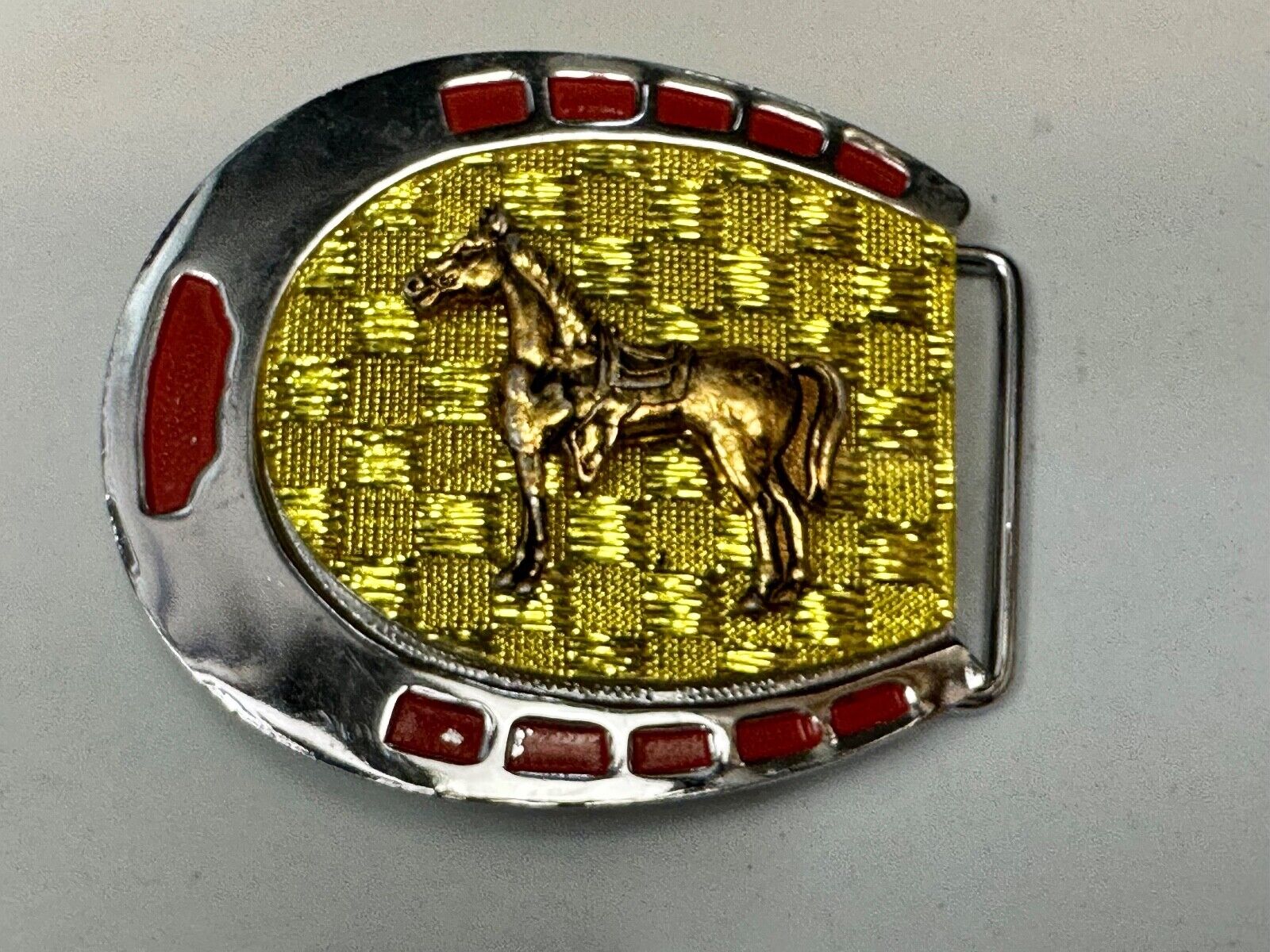 Artisan Resin covered Horseshoe shaped Belt Buckle with gold tone standing horse