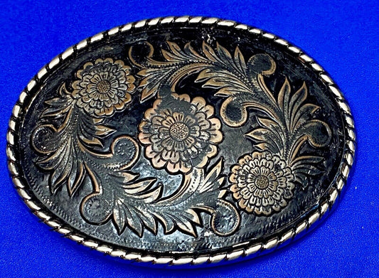 Beautiful flower design black & copper color oval outlined western belt buckle W